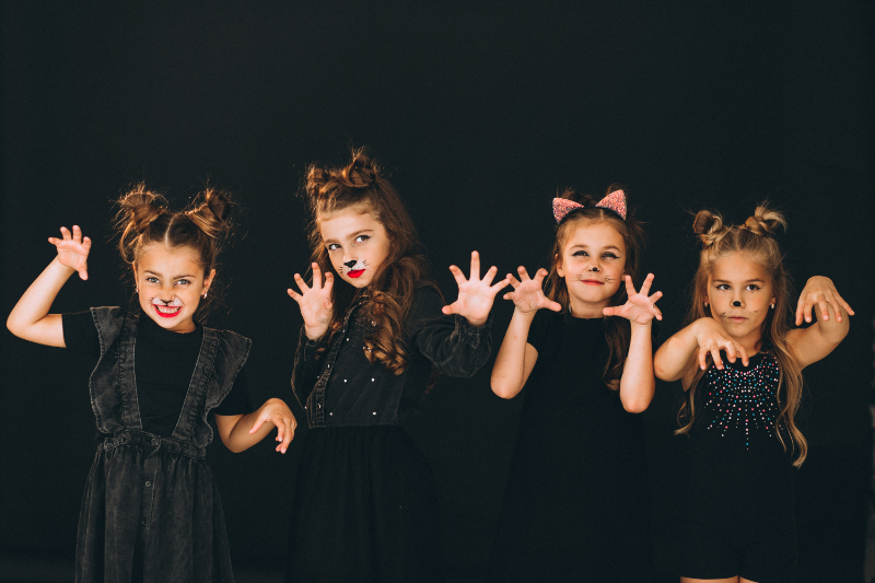 group-girls-dressed-halloween-costumes-studio